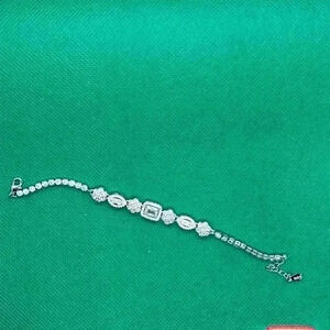 Cubic zirconia bracelet in halo mounting.